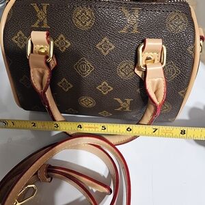 Elegant Brown and Tan Satchel with Gold Accents